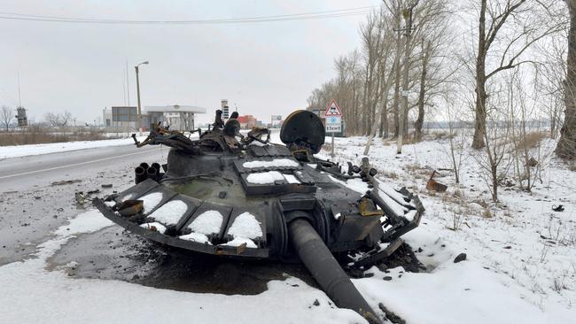 TOPSHOT – A fragment of a destroyed Russian tank is seen on the roadside on the outskirts of Kharkiv, during the ongoing invasion of Ukraine. Picture: AFP