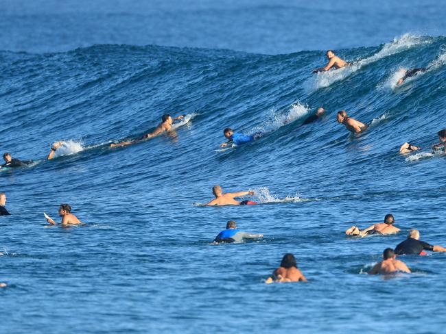 5th February 2021 -  Snapper Rocks, Coolangatta, Gold Coast.   Surfers fight for waves at Snapper Rocks Coolangatta as massive storm swell hits the east coast of South Queensland.Photo: Scott Powick NEWSCORP