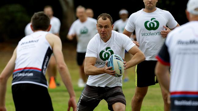 Woolworths and ResMed took to Bella Vista oval in a charity touch match on Friday.