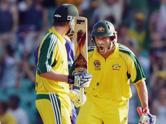 Mike Hussey (R) of Australia celebrates team mate Michael Clarke's four off the final ball of the innings during the 2nd Final of the VB Series between Australia and Sri Lanka played at the Sydney Cricket Ground on February 12, 2006 in Sydney, Australia. (Photo by Hamish Blair/Getty Images)