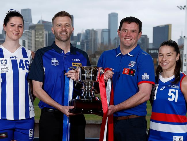 MELBOURNE, AUSTRALIA - JULY 15: (L-R) Jess Jones, Sarah King, Brett Gourley of the Kangaroos and Rhys Cahir, Dom Carbone of the Bulldogs pose during the 2024 rebel VFLW Grand Final media opportunity at ETU Stadium on July 15, 2024 in Melbourne, Australia. (Photo by Michael Willson/AFL Photos via Getty Images)