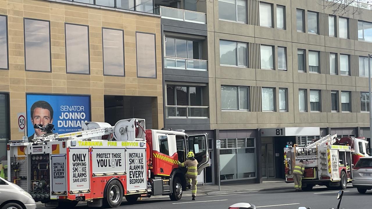 Tasmania Fire Service crews on scene at 85 Macquarie St, Hobart, after reports of a fire on level 8 of the building. Picture: Genevieve Holding