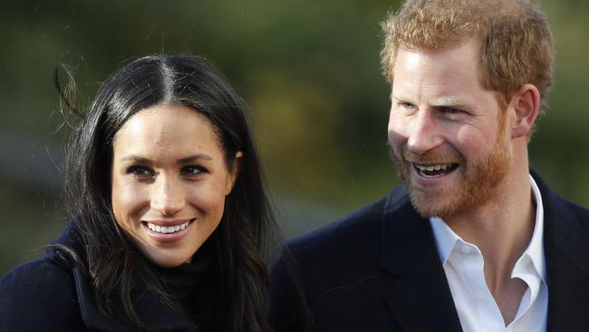 Happy couple: Prince Harry and his fiancee Meghan Markle. Picture: AP/Frank Augstein