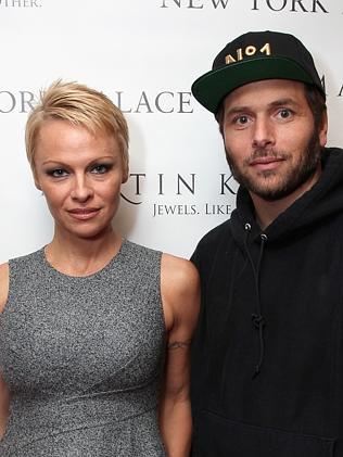 Keeping trim ... Pamela Anderson with husband Rick Salomon in November 2013. 