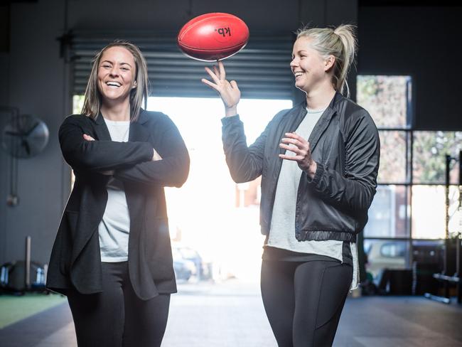 Former AFLW player Alex Saundry who owns More Than Management, and Katie Brennan. who is one of her clients. Picture: Eugene Hyland