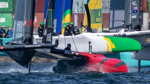 Switzerland SailGP Team helmed by Sebastien Schneiter in close action with Australia SailGP Team on Race Day 1 of the Rolex Los Angeles Sail Grand Prix held in the Port of Los Angeles, California, USA. Saturday 15 March 2025. Rolex SailGP Championship Event 4 Season 2025. Photo: Felix Diemer for SailGP. Handout image supplied by SailGP