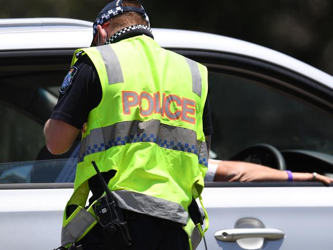 GOLD COAST, AUSTRALIA - NewsWire Photos - OCTOBER 28, 2021. Police perform border checks at the Queensland - New South Wales border at Coolangatta on the Gold Coast. Picture: NCA NewsWire / Dan Peled