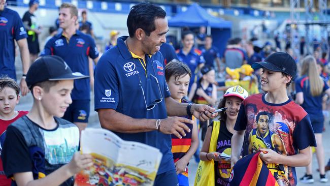 Eddie Betts signs autographs at the Adelaide Crows season launch in 2018. Picture: Tom Huntley.