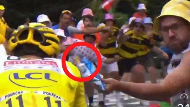 The Professional Cyclists Association has threatened to take legal action after a spectator threw chips at two cyclists during stage 14 of the Tour de France on Saturday.