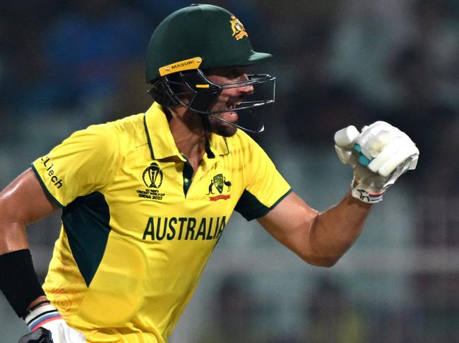 Australia's Mitchell Starc celebrates their win at the end of the 2023 ICC Men's Cricket World Cup one-day international (ODI) second semi-final match against South Africa at the Eden Gardens in Kolkata on November 16, 2023. (Photo by Arun SANKAR / AFP) / -- IMAGE RESTRICTED TO EDITORIAL USE - STRICTLY NO COMMERCIAL USE --