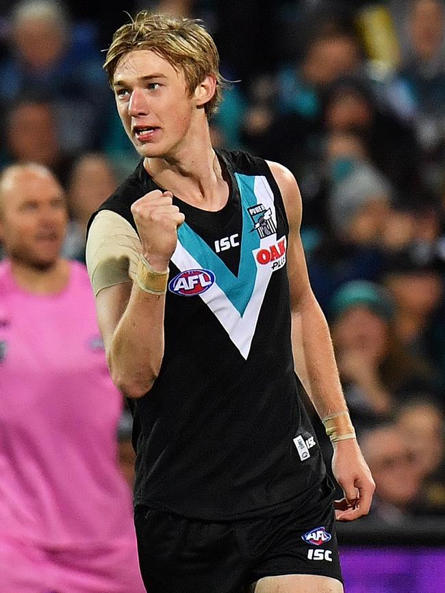 Todd Marshall celebrates his first goal in AFL football.