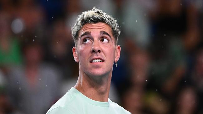 Thanasi Kokkinakis’ match did not start until almost 10pm due to rain.