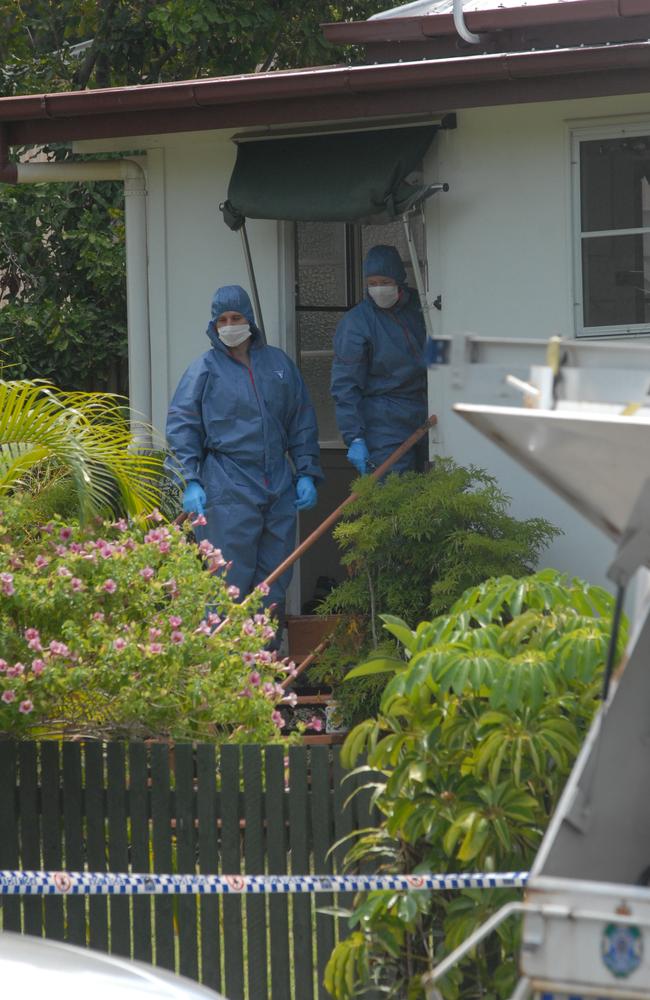 Police officers investigating the Pheasant Street scene at Slade Point where Darlene Saltner was stabbed to death. Photo: Tony Martin