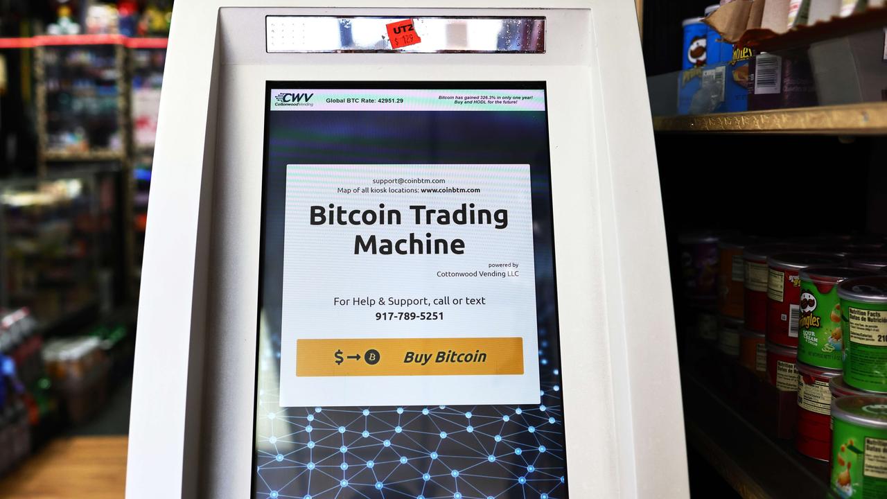 A bitcoin ATM is seen inside the Big Apple Tobacco Shop on February 08, 2021 in New York City. Tesla announced on Monday that it purchased $1.5 billion worth of bitcoin. The car company also announced that it will start accepting payments in bitcoin in exchange for its products which include their electric cars and solar panels. Picture: Michael M. Santiago/Getty Images/AFP