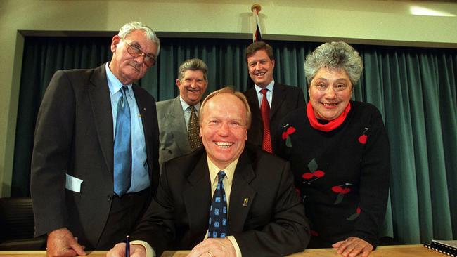 Elder Graham Dillon pictured with Minister Tom Barton, Jupiters Casino MD Rob Hines, Yugambeh historian Ysola Best and Premier Peter Beattie signing the Gold Coast Convention Centre deal in August 2001.