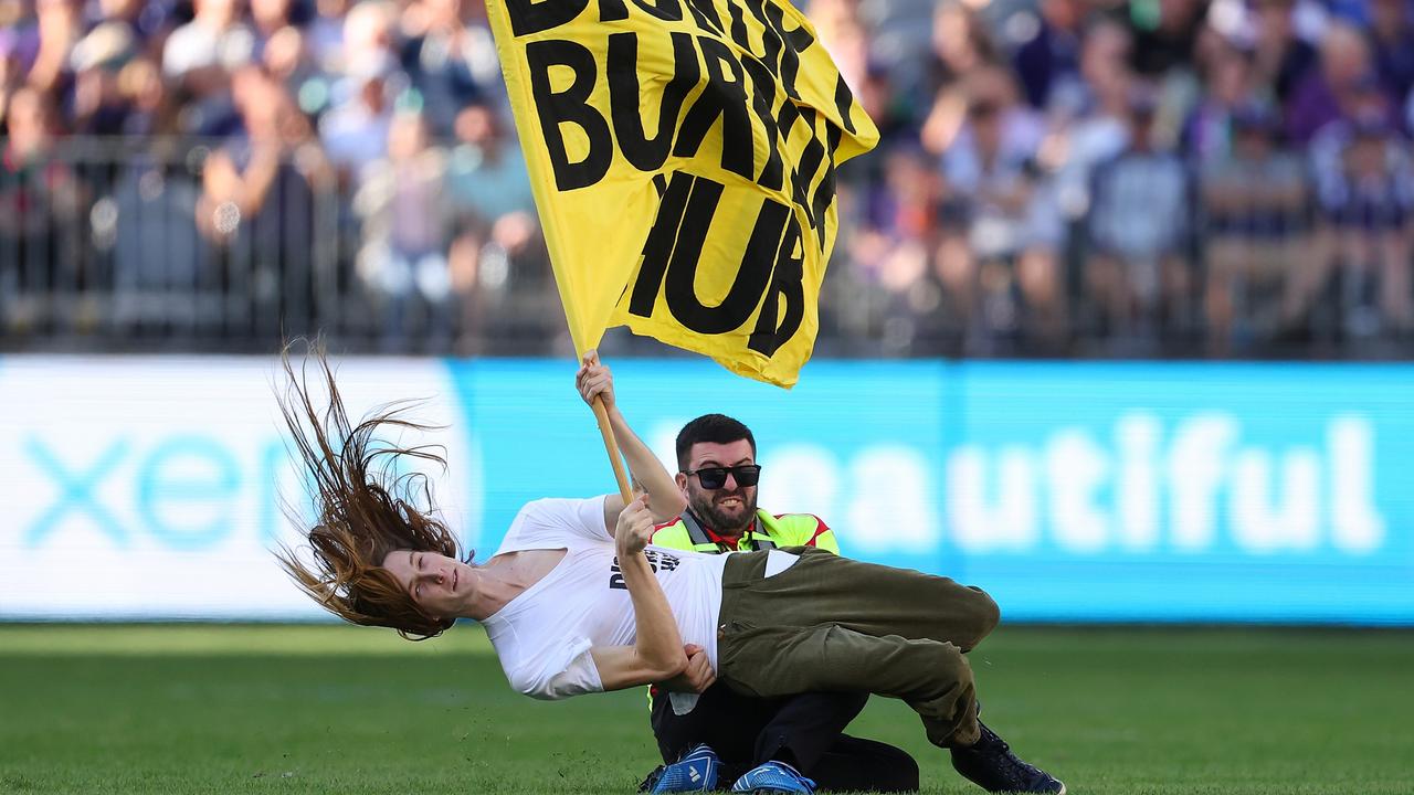 Reason for protester’s AFL pitch invasion