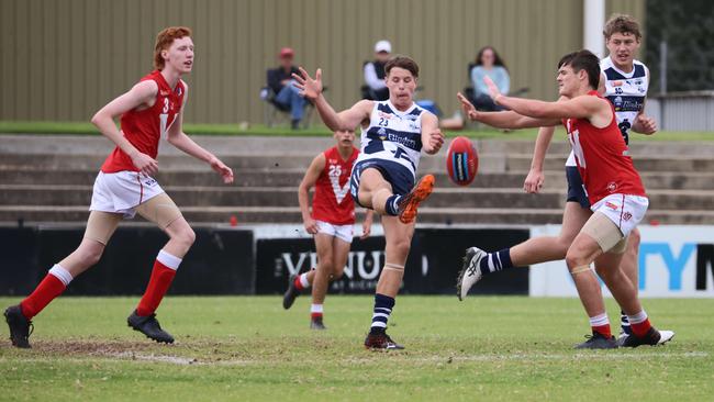 South Adelaide under-16 talent Tom Weaton kicks out of danger during the SANFL semi-final clash with North Adelaide, which was live streamed by The Advertiser. Picture: Russell Millard