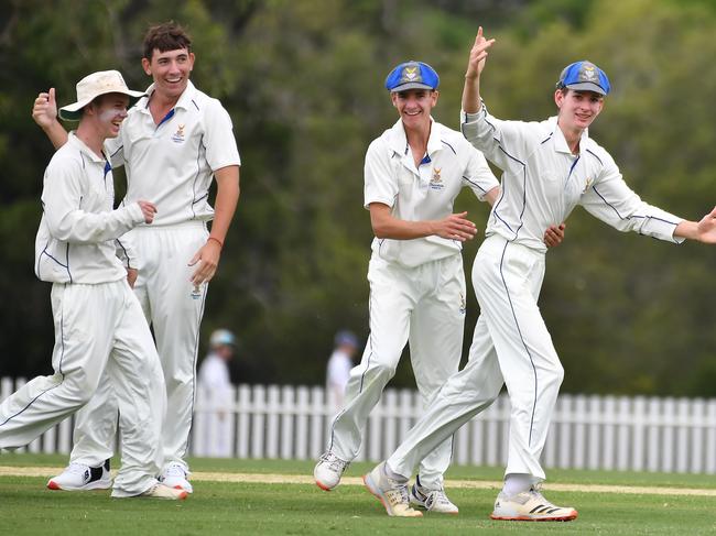 Churchie players celebrate a wicketFirst XI cricket between Churchie and Ipswich Grammar School.Saturday February 5, 2022. Picture, John Gass.