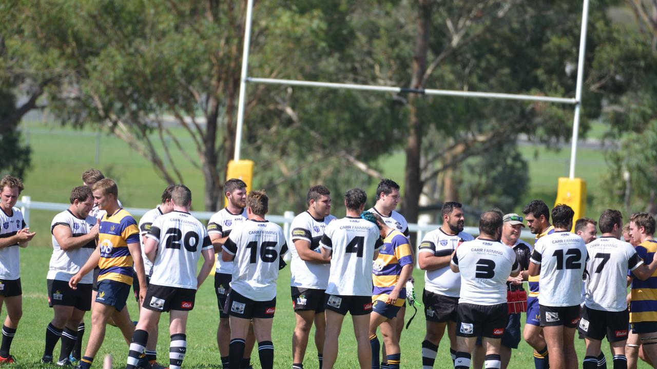 Warwick Water Rats (white) and Dalby players after a tough B-grade game at Risdon Oval.