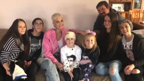 Katy Perry with sick Adelaide fan Grace Moores and her family at their Banksia Park home.