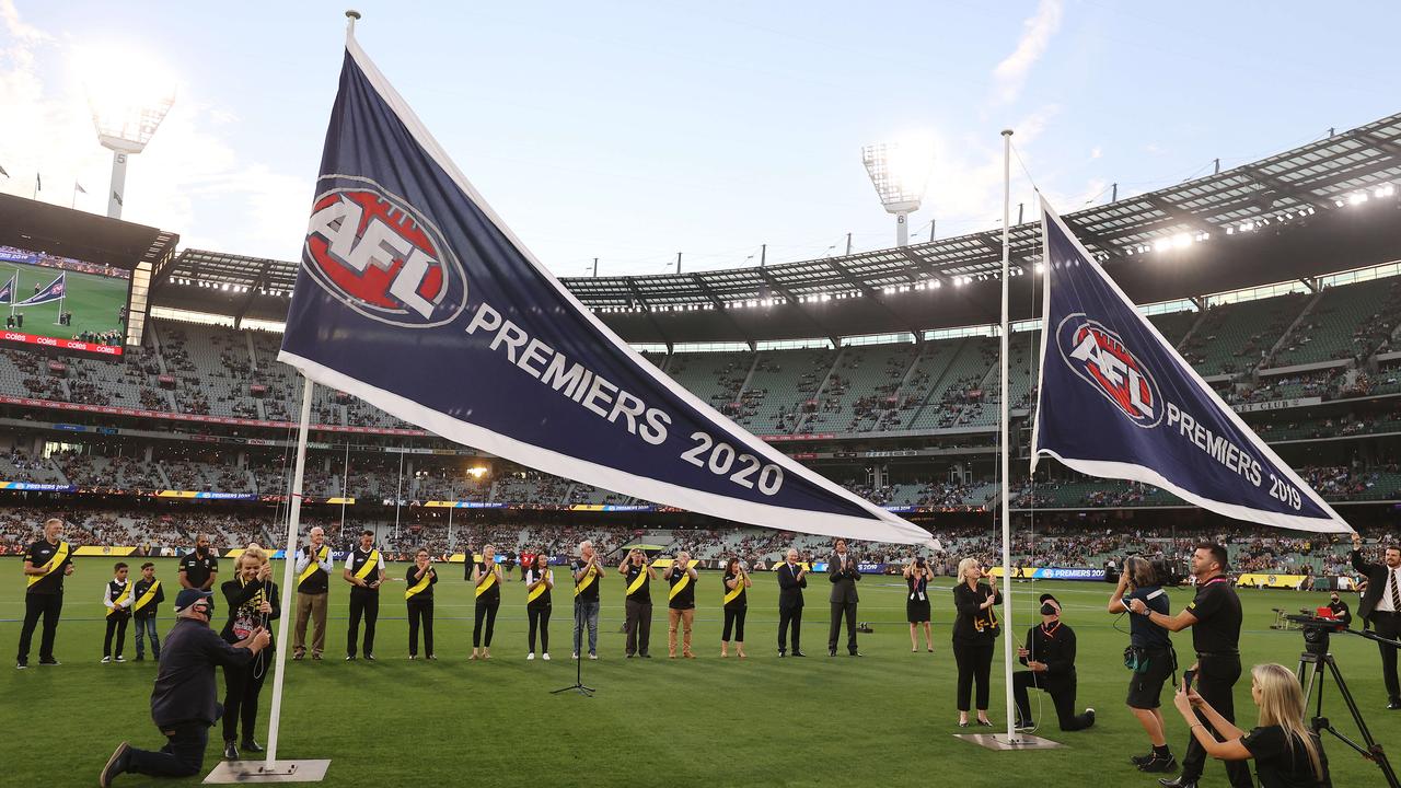 Richmond unveils its 2019 and 2020 premiership flags in Round 1 this year. Picture: Michael Klein