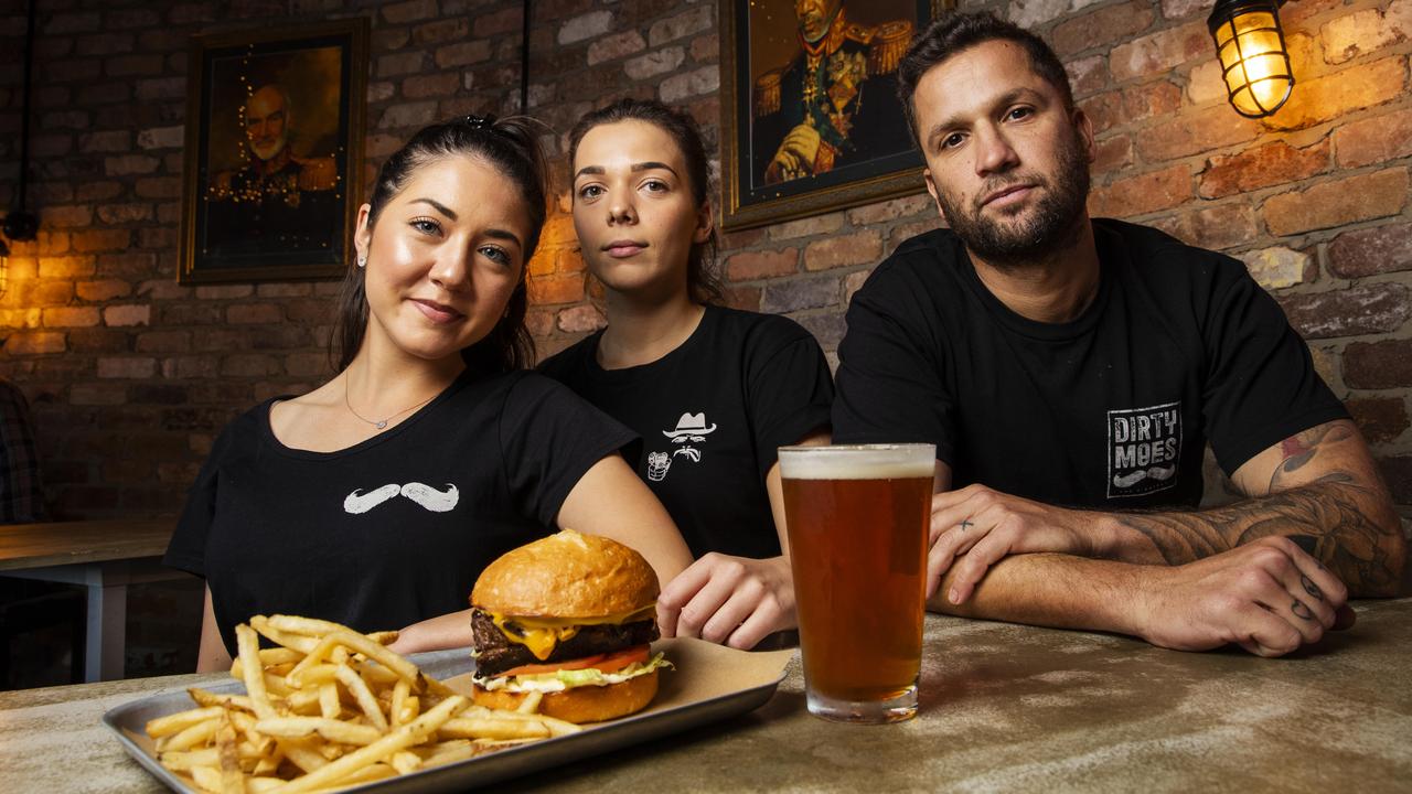 Staff from Dirty Moes Bar and Eatery on Mooloolaba Esplanade. Photo Lachie Millard