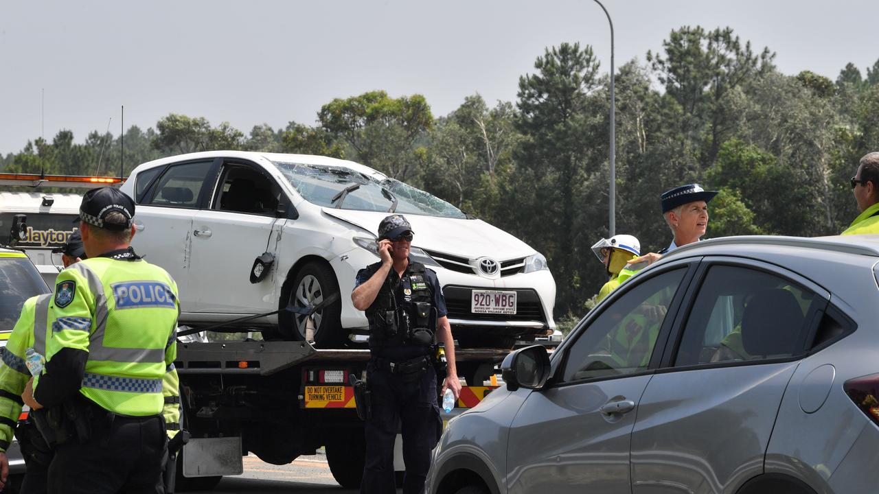 Police apprehended a man and woman at gunpoint after they led emergency services on a car chase from Hervey Bay. The alleged stolen car ended up on its roof and the occupants were taken into custody. Photo: John McCutcheon / Sunshine Coast Daily