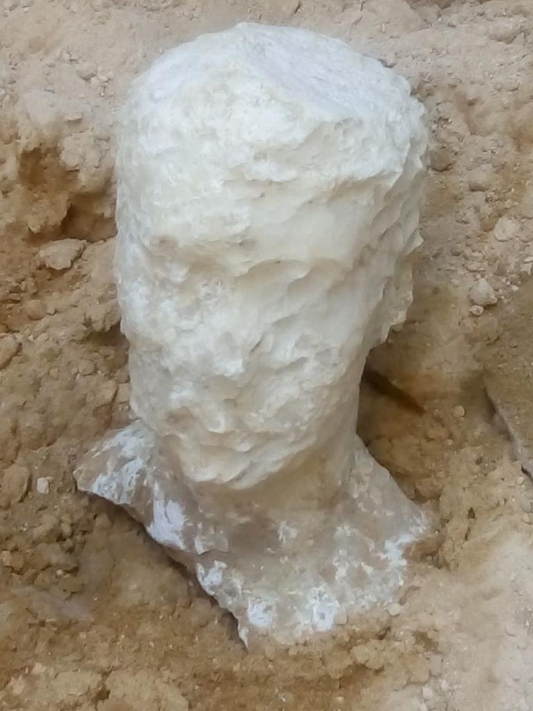 The alabaster head of a man found in an ancient tomb in Alexandria. Picture: AFP PHOTO / EGYPTIAN ANTIQUITIES MINISTRY.