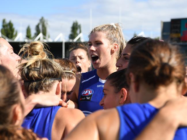 Abbey Green of the Kangaroos sings team song after the win during the Round 2 AFLW match between the North Melbourne Kangaroos and the GWS Giants at UTAS Stadium. Picture: STEVE BELL/GETTY IMAGES