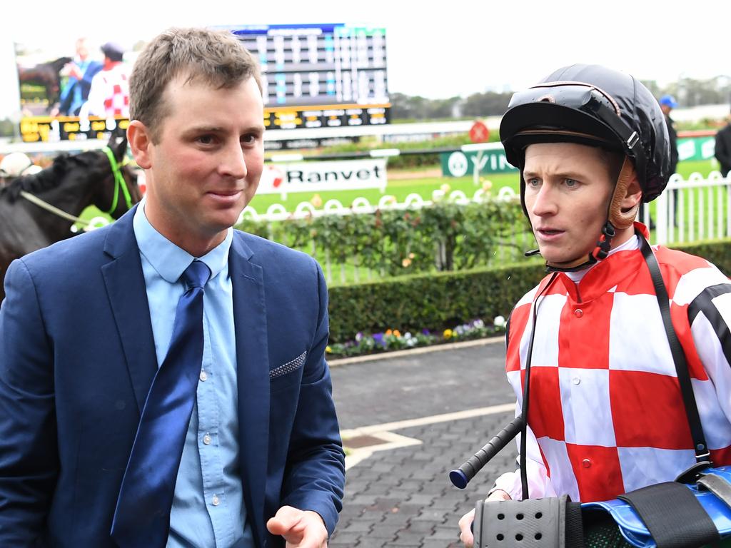 Jockey James McDonald speaks with trainer Stirling Osland after winning race 4, the TAB Highway Handicap on Radiant Choice during Rosehill Gardens Race Day at Rosehill Gardens in Sydney, Saturday, June 2, 2018. (AAP Image/David Moir) NO ARCHIVING, EDITORIAL USE ONLY