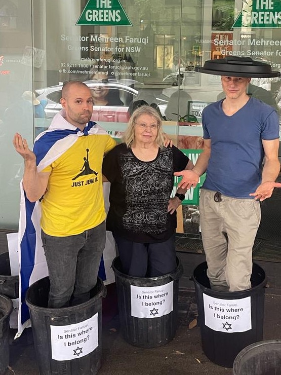 Pro-Israel protesters outside Senator Mehreen Faruqi's office on November 25, after the senator posted a picture with an anti-Semitic placard suggesting Israel and Israelis should be put in the bin. Ofir Birenbaum is pictured left.