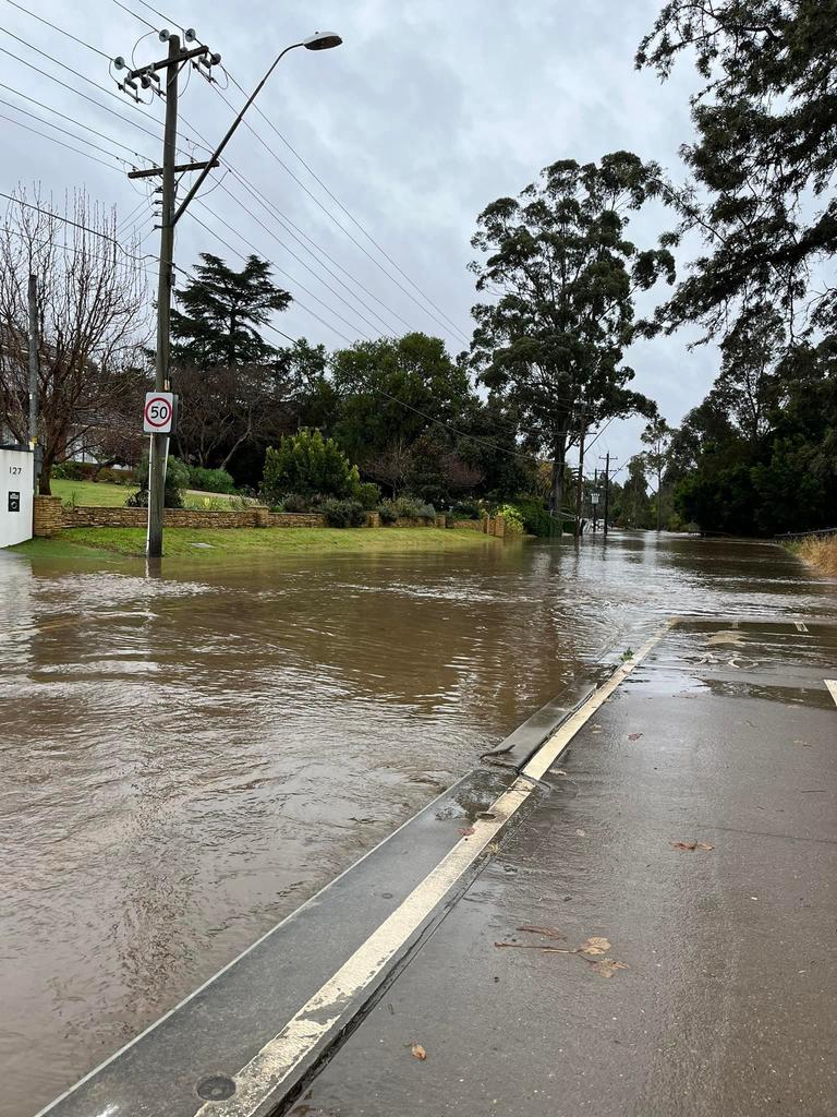 Upstream at Emu Plains, the Nepean River has risen to road height.