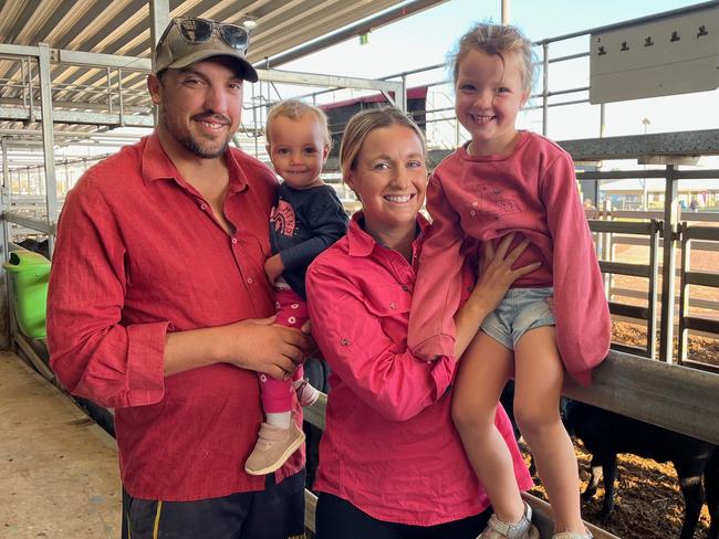 Sam and Kelly Livinstone, Rutherglen and their children Addi, 1, and Macey, 5, bought Angus cows and calves to $1600 and Hereford heifers for $930 at the Wodonga store cattle sale.