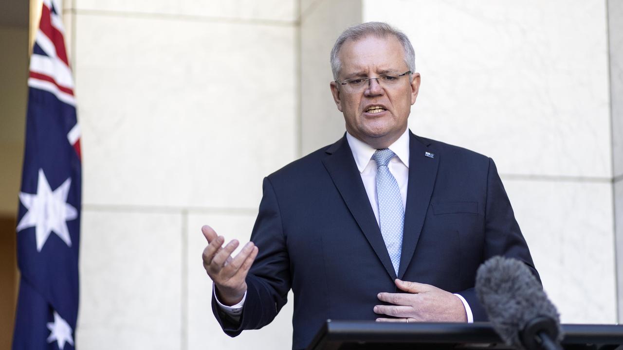 Prime Minister Scott Morrison with the Treasurer Josh Frydenberg during a press conference at Parliament House in Canberra this morning. Picture: Gary Ramage