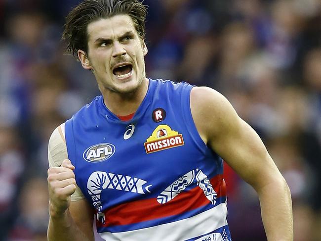 MELBOURNE, AUSTRALIA - MAY 27:  Tom Boyd of the Bulldogs celebrates a goal  during the round 10 AFL match between the Western Bulldogs and the St Kilda Saints at Etihad Stadium on May 27, 2017 in Melbourne, Australia.  (Photo by Darrian Traynor/Getty Images)