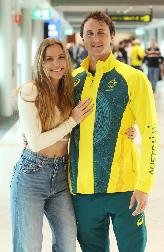 Cam McEvoy with Madeline after arriving home from Paris. Picture: Liam Kidston