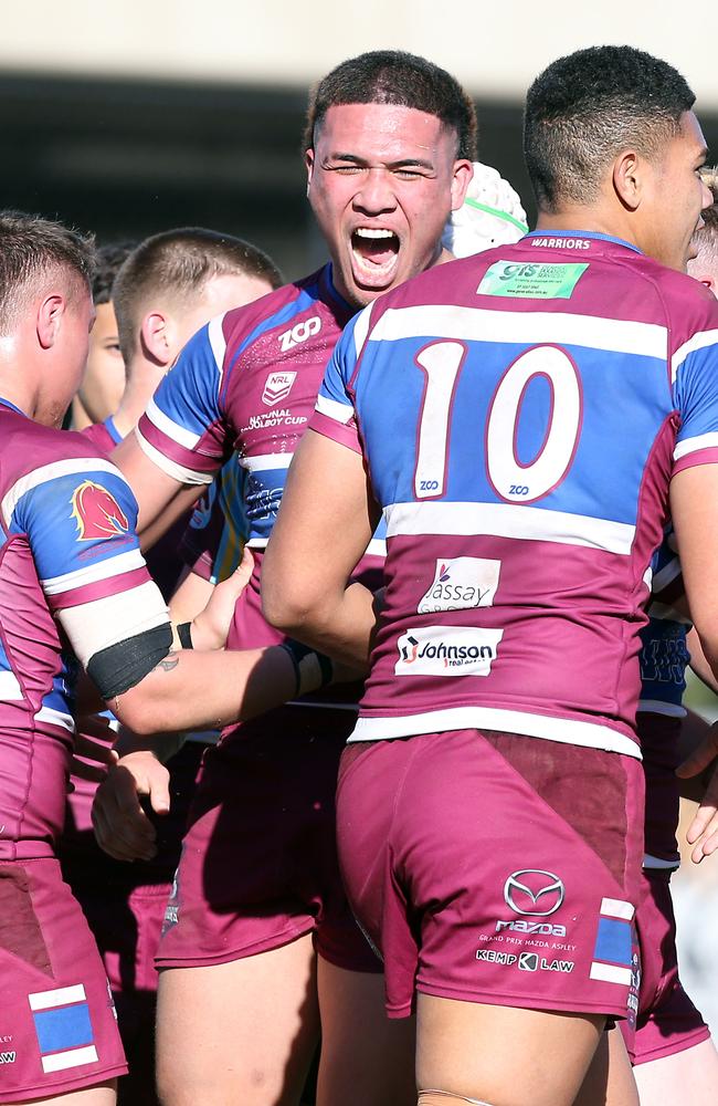 Caleb Esera screams after a scoring a crucial try for Wavell SHS. Picture: AAP Image/Richard Gosling