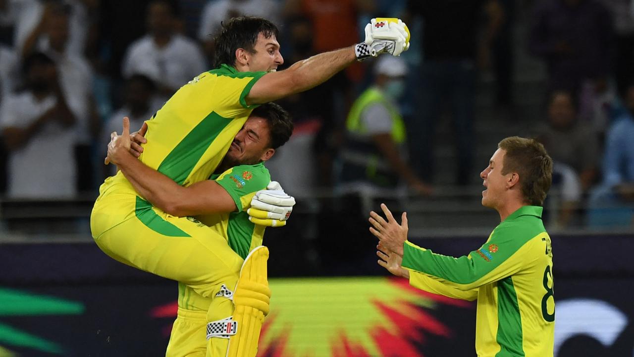 Nobody was happier for Marsh than his teammates. (Photo by Indranil Mukherjee / AFP)