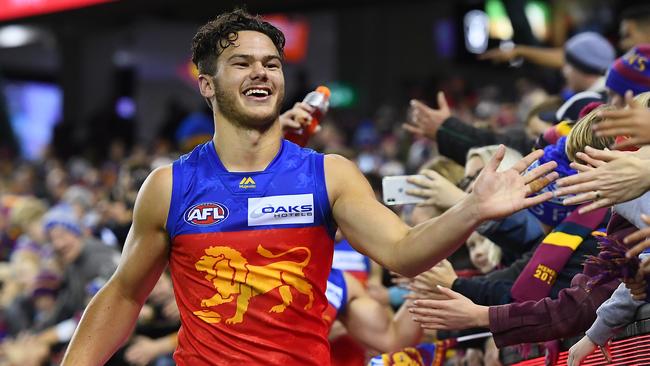 Cam Rayner celebrates with Lions fans after Brisbane’s win over St Kilda. Picture: Getty Images