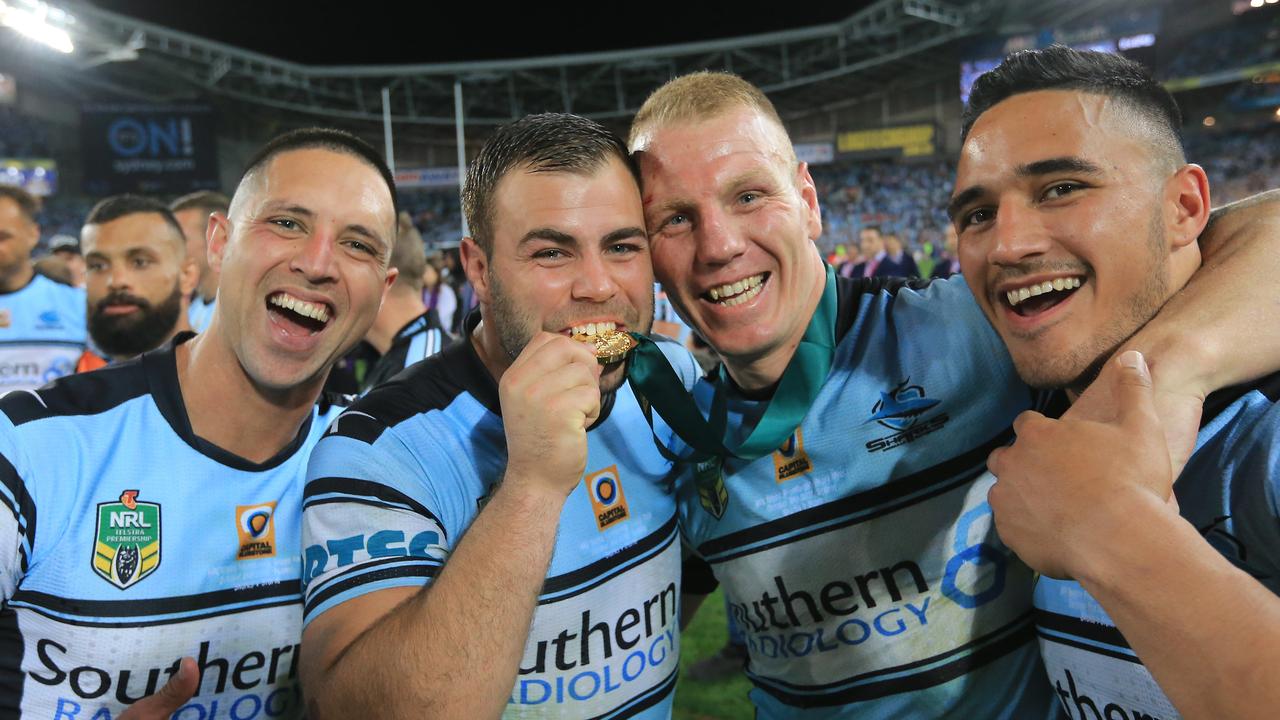 Gerard Beale, Wade Graham, Luke Lewis and Valentine Holmes after the Cronulla Sharks’s grand final win