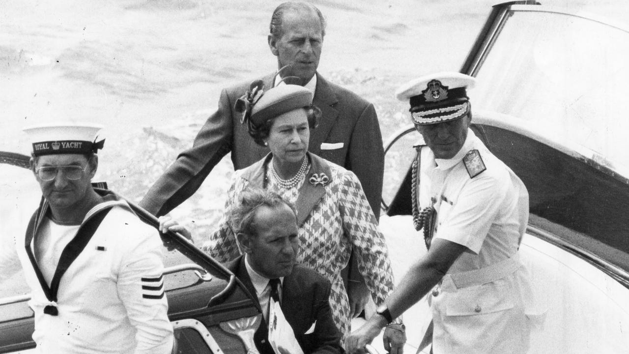 The Queen and Prince Philip aboard the Royal barge, which almost made it to the Glenelg jetty but was forced back due to strong winds and swell.