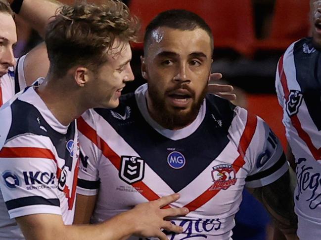 NEWCASTLE, AUSTRALIA - MAY 01: Matt Ikuvalu of the Roosters celebrates his try with team mates during the round eight NRL match between the Newcastle Knights and the Sydney Roosters at McDonald Jones Stadium, on May 01, 2021, in Newcastle, Australia. (Photo by Ashley Feder/Getty Images)