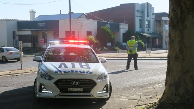 Wagga police at the intersection of Gurwood and Trail streets. Picture: Toby Vue