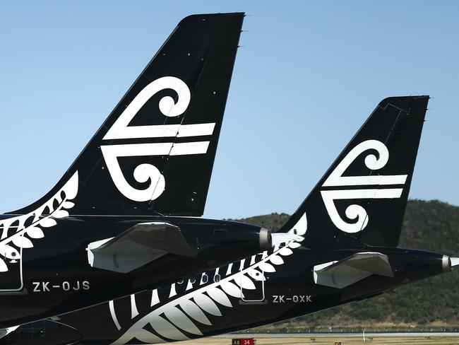 WELLINGTON, NEW ZEALAND - MARCH 16: The tails of Air New Zealand planes at Wellington Airport on March 16, 2020 in Wellington, New Zealand. Strict new border measures to contain the spread of COVID-19 came into effect at 1am on Monday, requiring all arrivals into New Zealand to self-isolate for 14 days upon arrival. Those in self-isolation must avoid social gatherings, work, school, child care facilities, university, religious gatherings, aged care and health facilities, prisons, sports gatherings, restaurants, and all public gatherings during the two-week period. New Zealand currently has eight confirmed cases of COVID-19. (Photo by Hagen Hopkins/Getty Images)