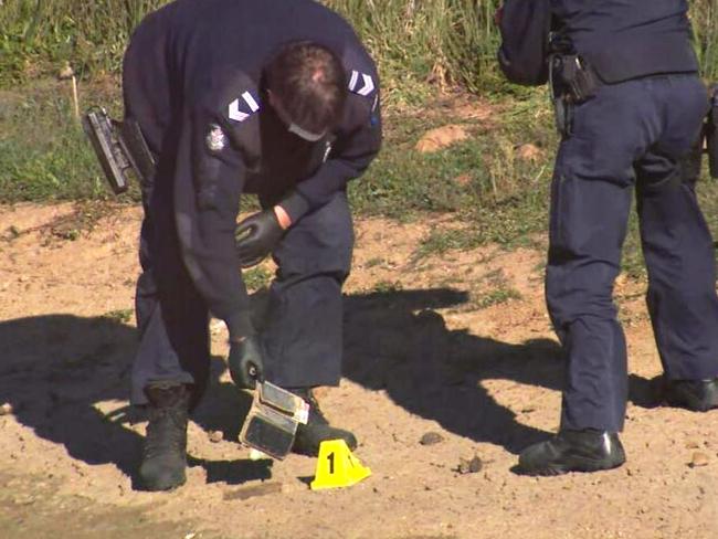 When specialist ‘technology’ dogs were brought in to search for a missing mobile phone, a phone was found on the edge of a dam. Picture: 9News