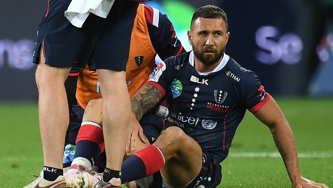 Rebels five-eighth Quade Cooper was concussed trying to tackle Reds captain Samu Kerevi on Friday night. Picture: AAP