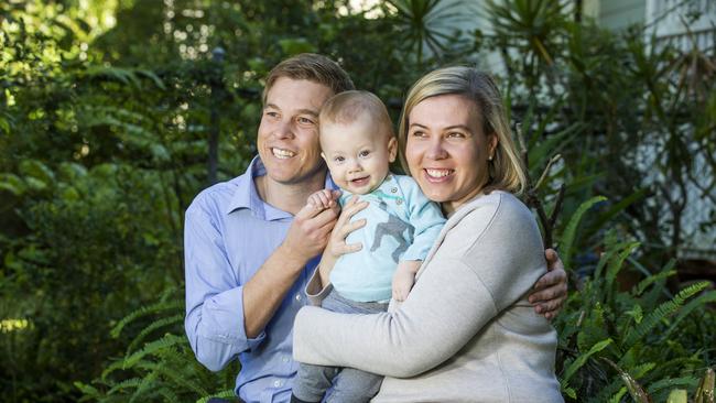 Cr Julian Simmonds has won preselection in the federal seat of Ryan. He is pictured here with his wife Madeline and 10-month-old son Theodore. Picture: AAP Image/Renae Droop