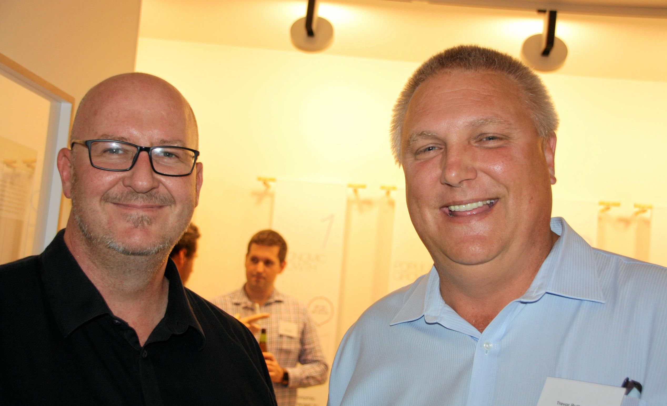 Cameron Sheedy of OGE Group and Trevor Ruthenberg of Mosaic Property Group at the opening of the company's new Sunshine Coast office at Duporth Avenue, Maroochydore. Picture: Erle Levey