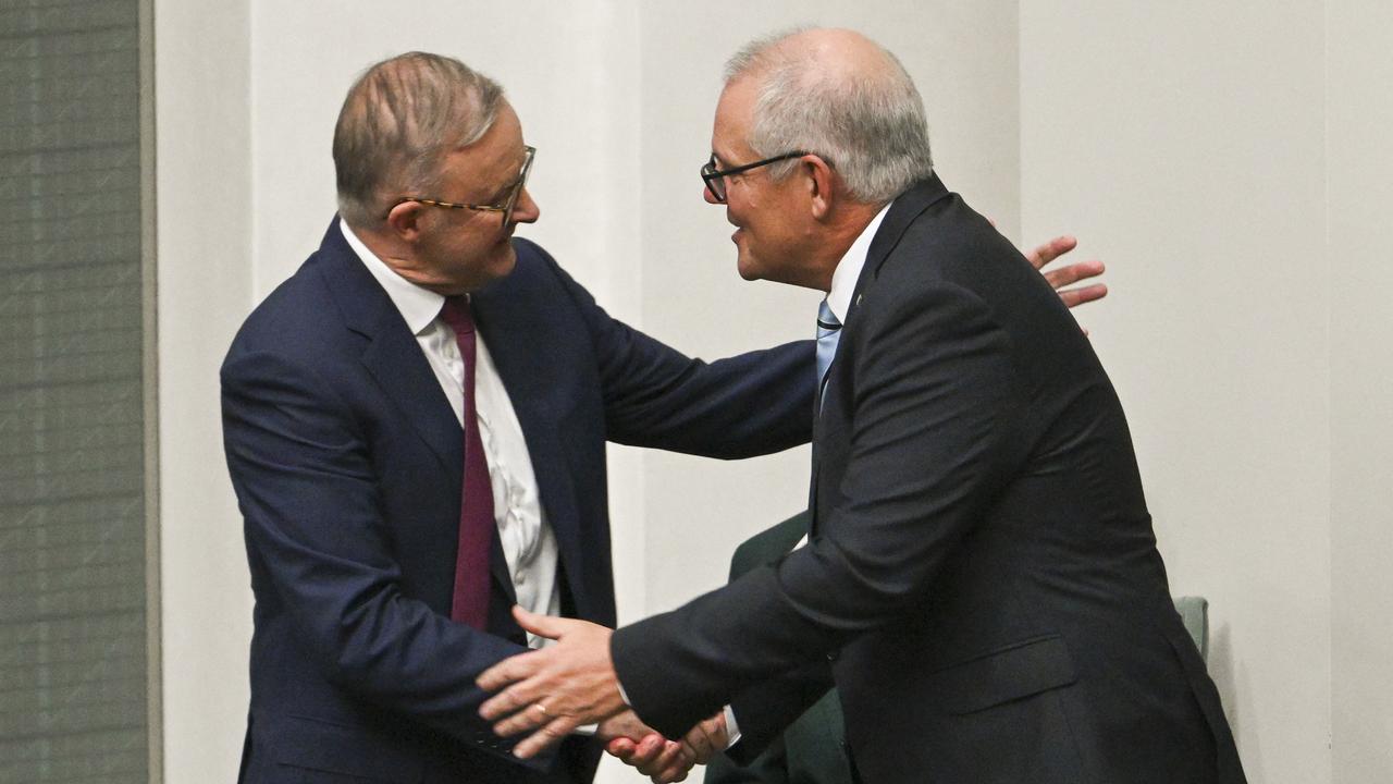 CANBERRA, AUSTRALIA, NewsWire Photos. FEBRUARY 27, 2024:  The Prime Minister, Anthony Albanese shakes Scott Morrison's hand after his valedictory speech to Parliament in the House of representatives at Parliament House in Canberra. Picture: NCA NewsWire / Martin Ollman