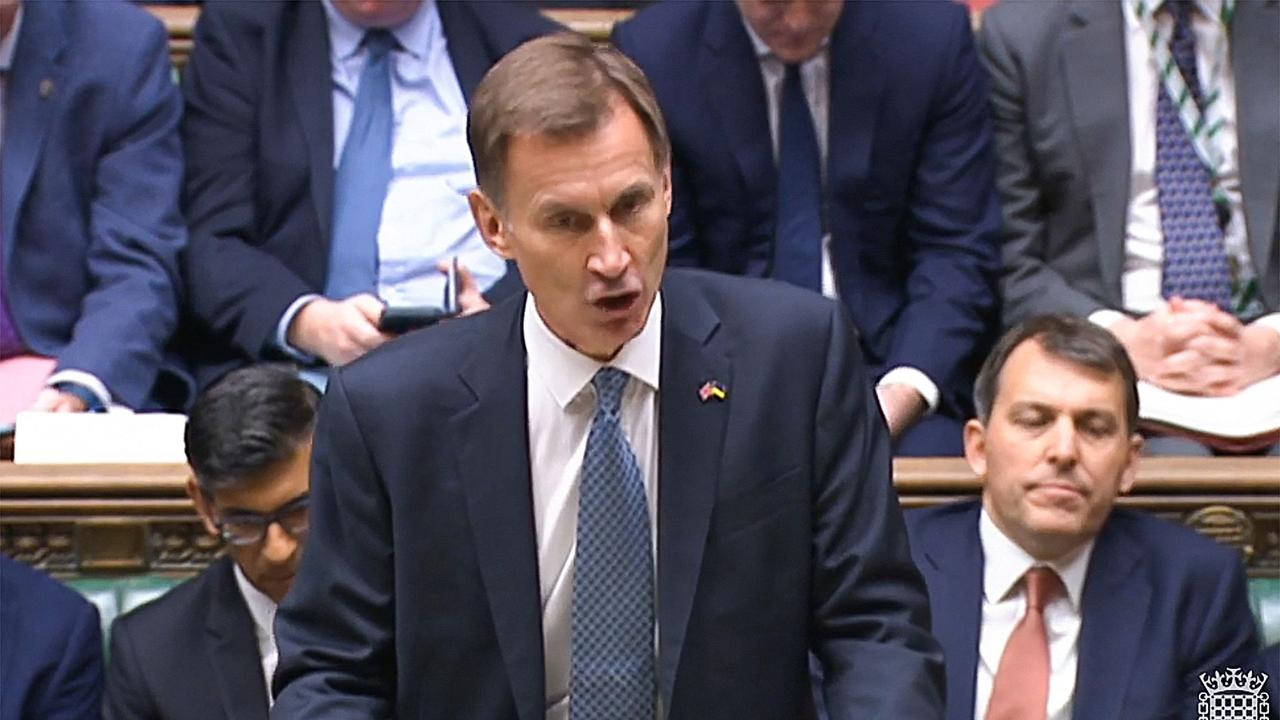 UK Chancellor Jeremy Hunt delivers his Autumn Statement (Photo by Handout / PRU / AFP)